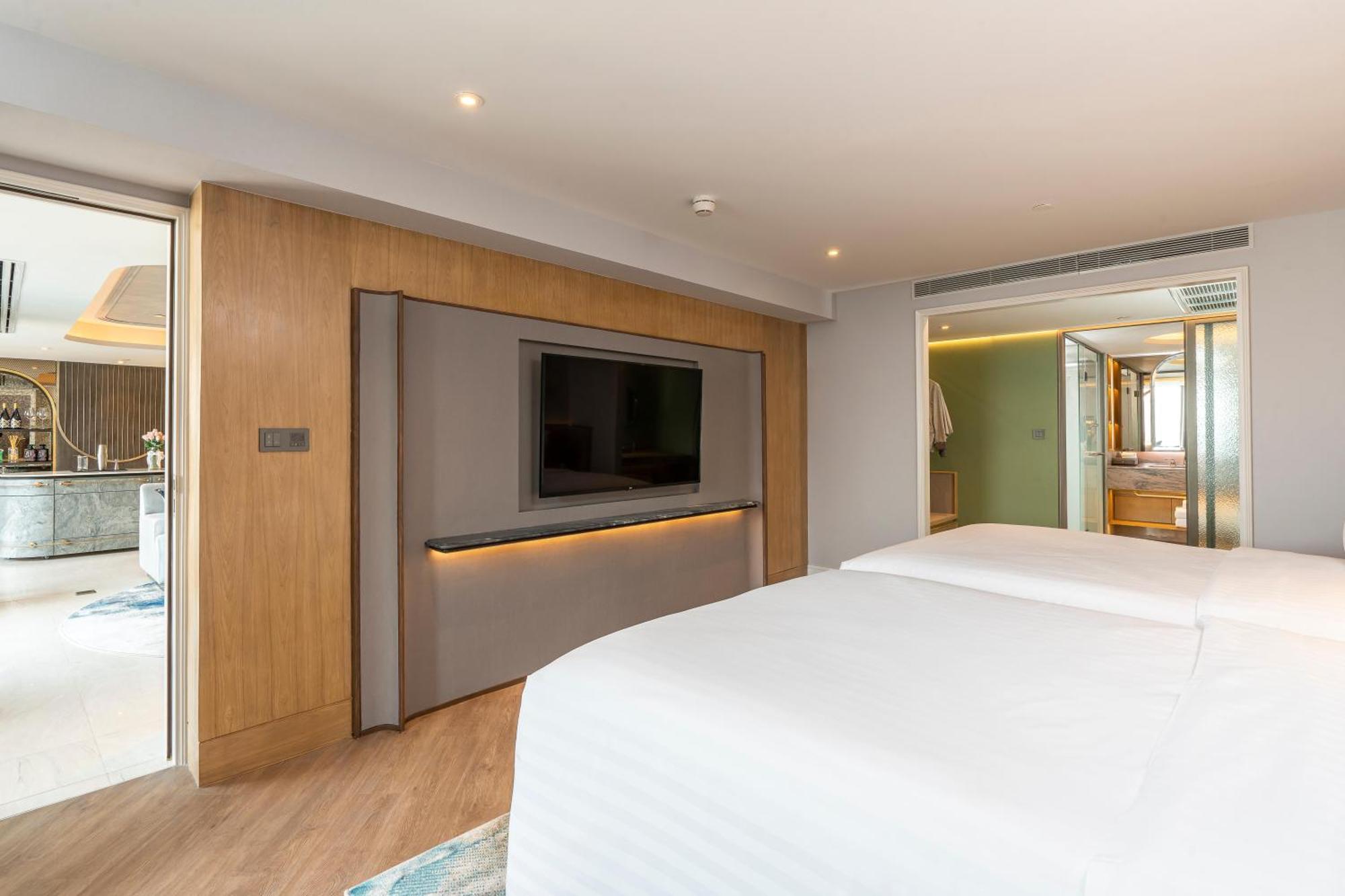 The Salil Hotel Riverside Bangkok Banguecoque Exterior foto A bedroom at the hotel