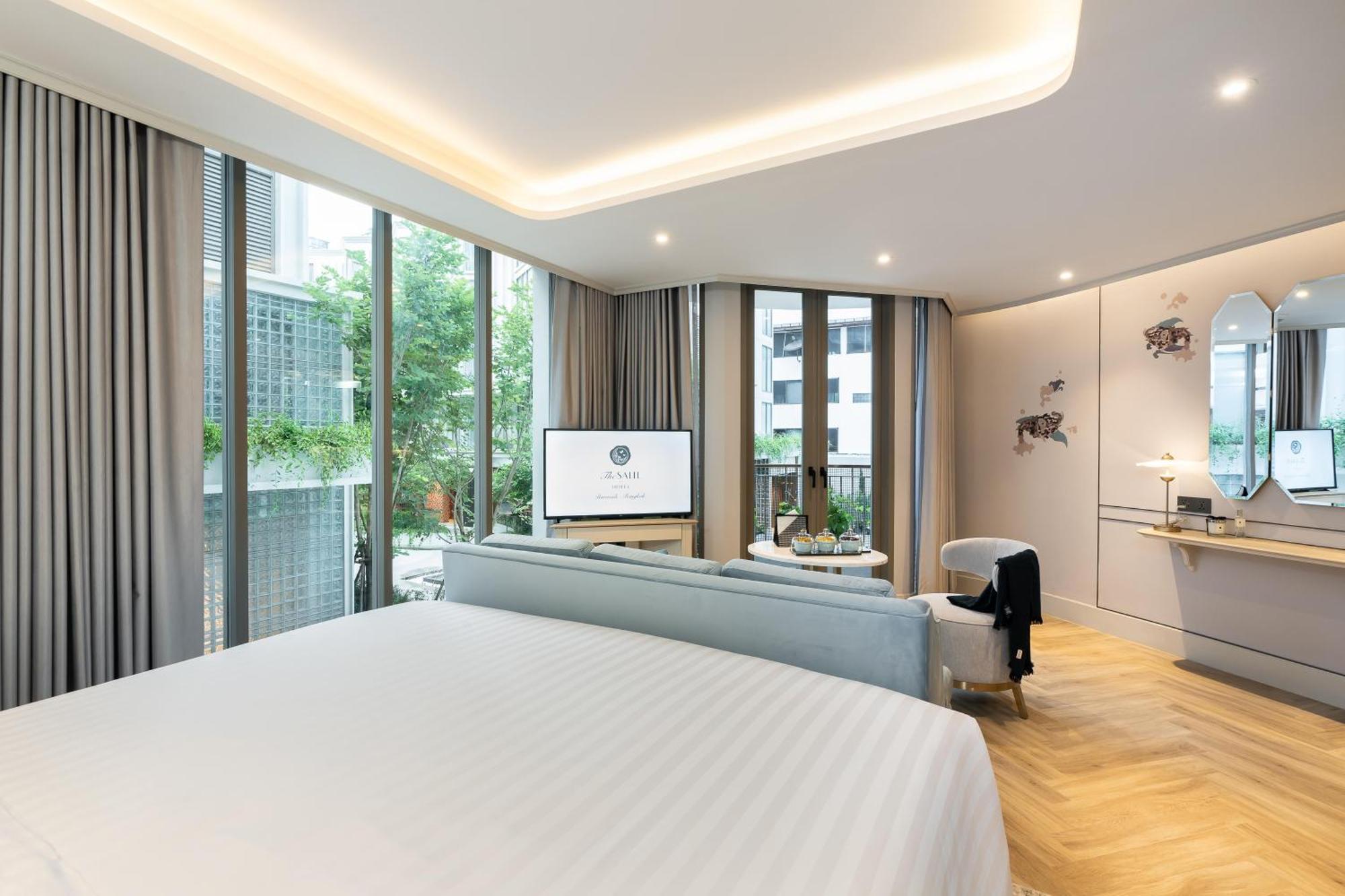 The Salil Hotel Riverside Bangkok Banguecoque Exterior foto Deluxe Room